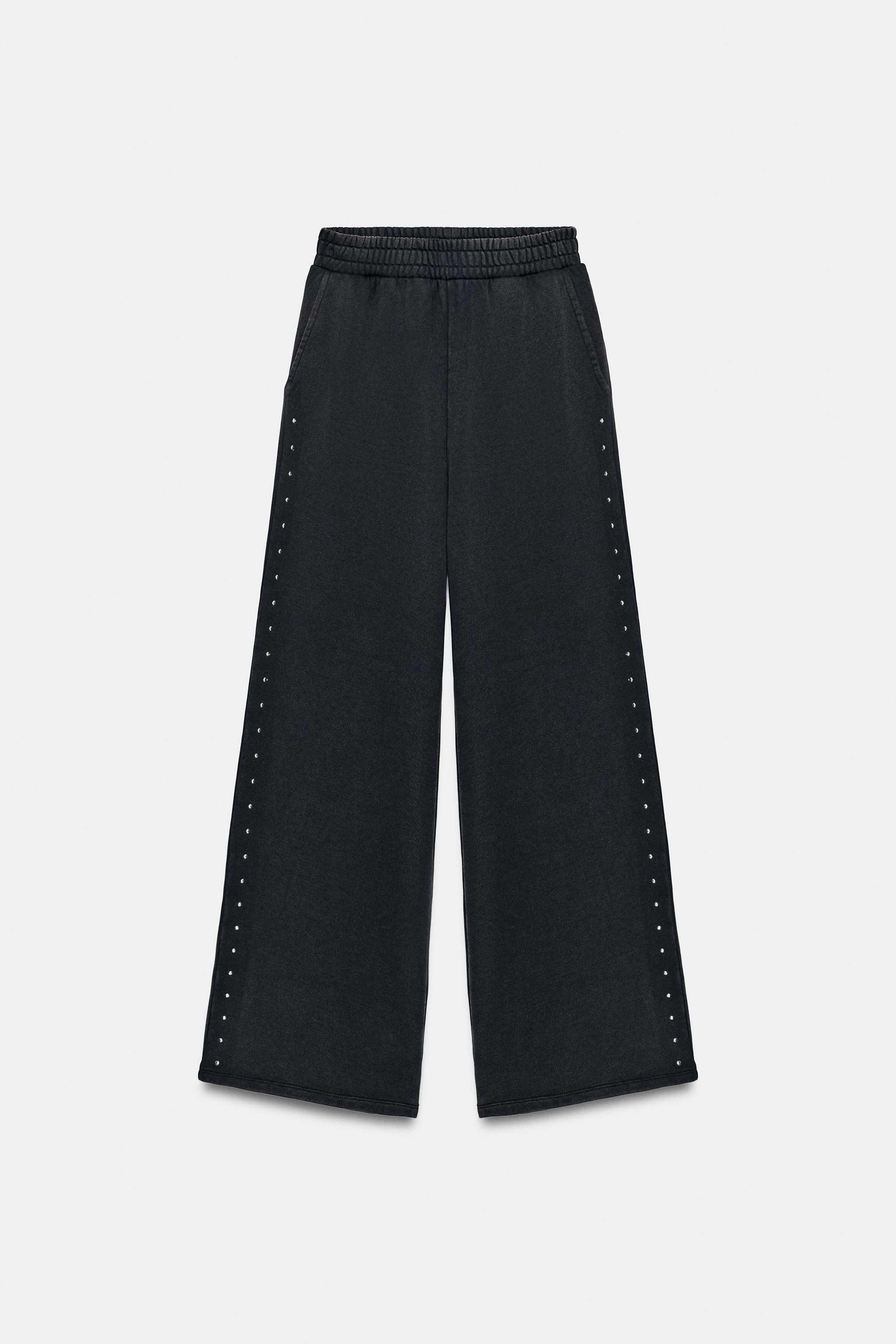 WASHED EFFECT FLEECE PANTS WITH STUDS